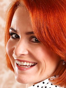 milf; pantyhose; redhead; shaved pussy; solo; 